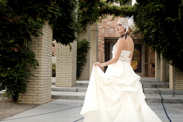 dramatic pose of bride in walkway - wedding photo by top Orange County, California wedding photographers D. Park Photography
